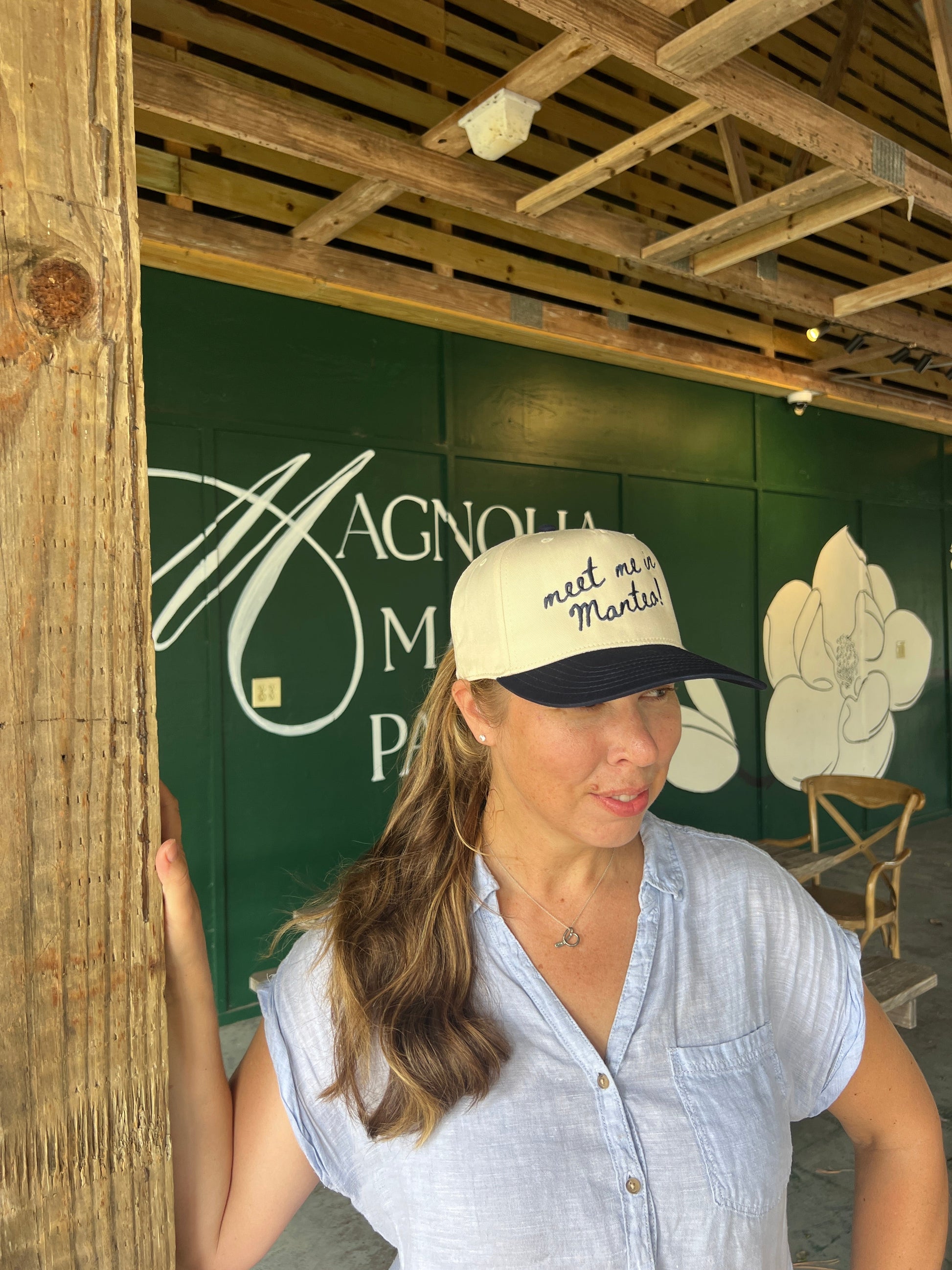 Meet Me in Manteo ball cap - smiling
